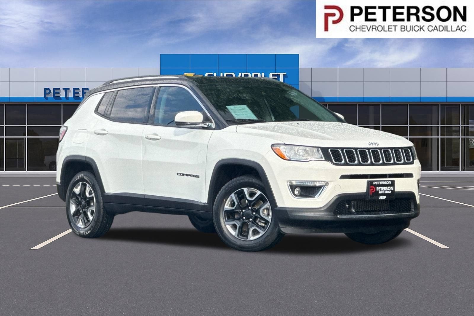2021 Jeep Compass Limited in Pearl White Tri-Coat — front three-quarter view